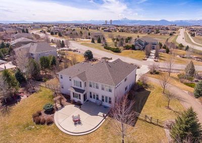 Aerial view of suburban neighborhood with large houses.